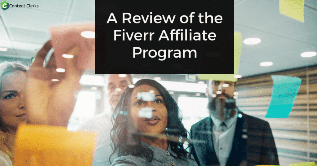 A group people look at a glass board with sticky notes on it-A Review of the Fiverr Affiliate Program